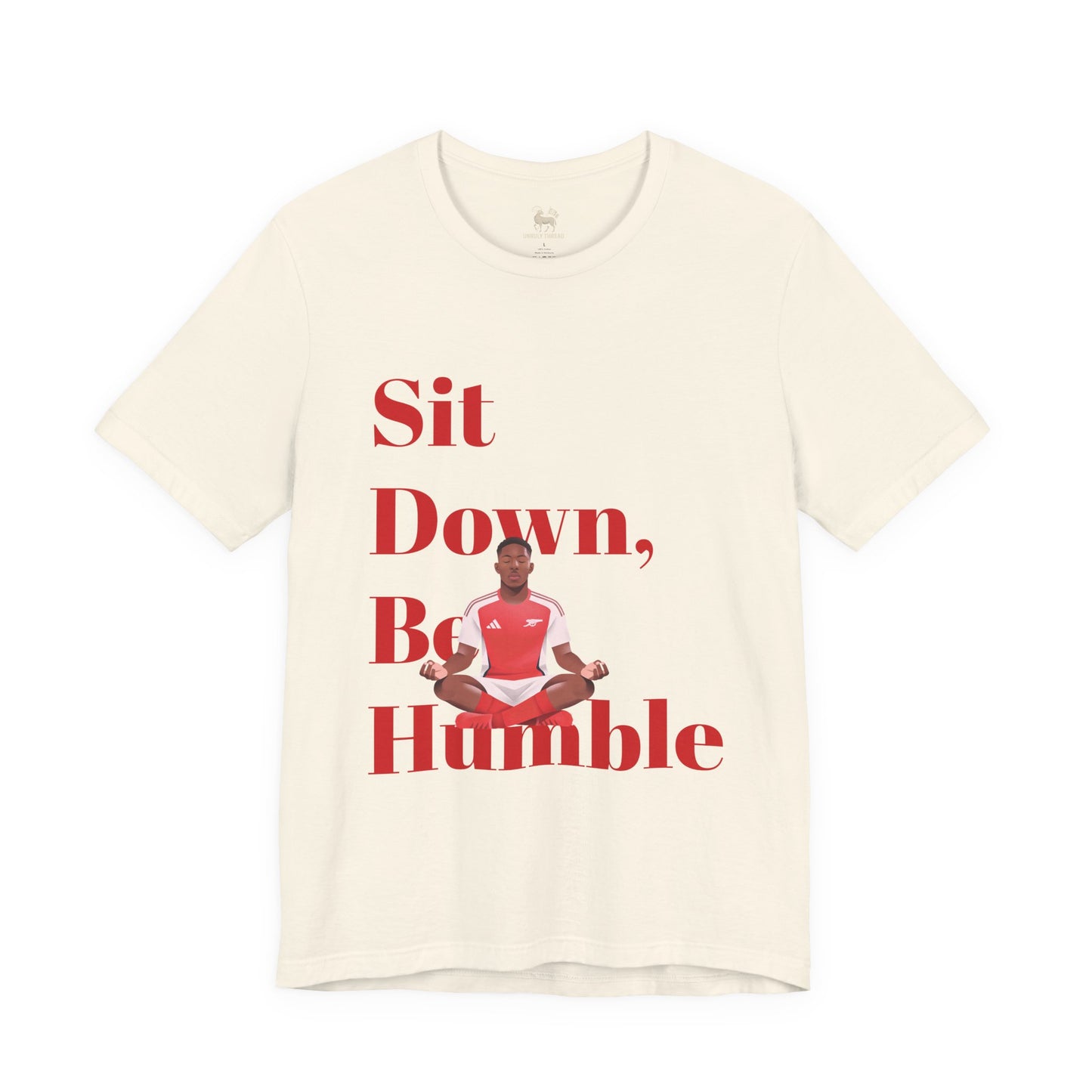 Detail of the Sit Down, Be Humble chest print — Myles Lewis-Skelly's meditation pose between the words Be and Humble.