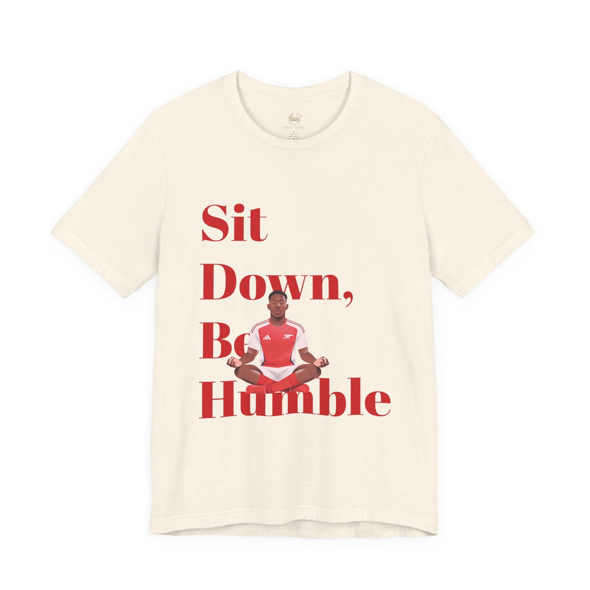 Detail of the Sit Down, Be Humble chest print — Myles Lewis-Skelly's meditation pose between the words Be and Humble.