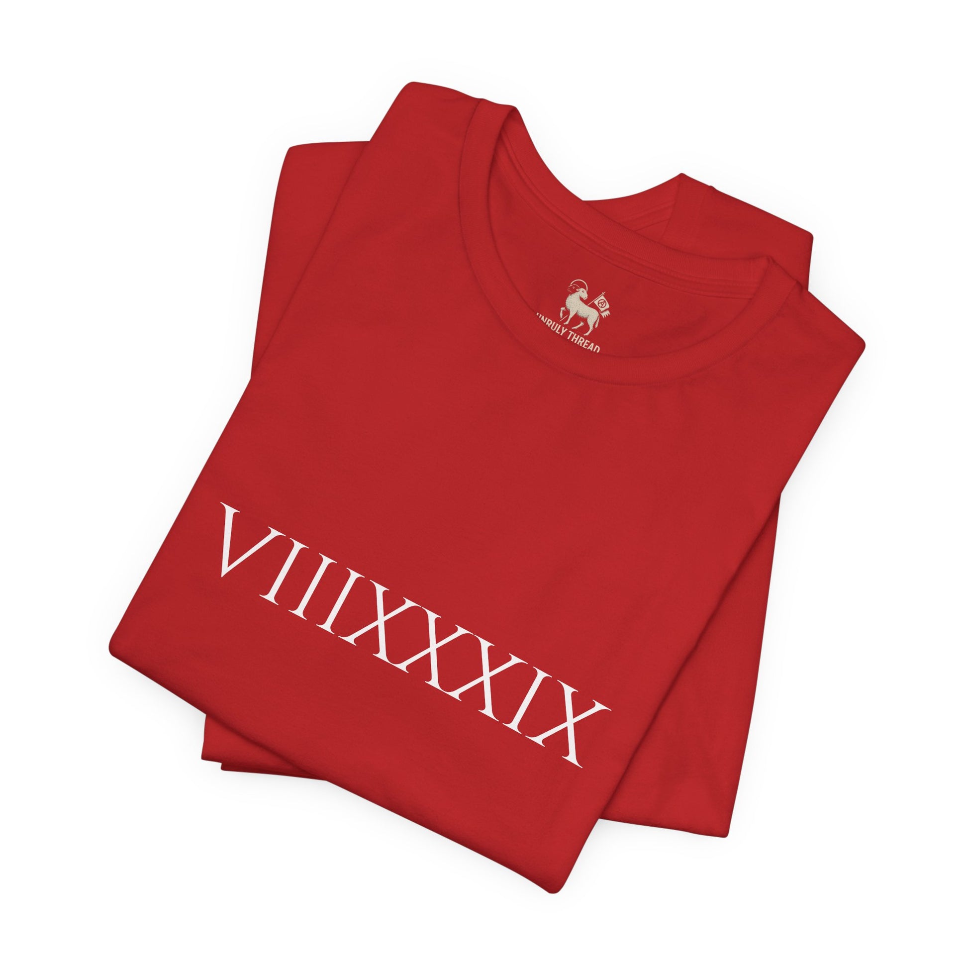 Detail of the VIIIXXXIX Roman numeral chest print on the Invincibles to Unforgettables tee — Arsenal 22-year title wait, Unruly Thread.