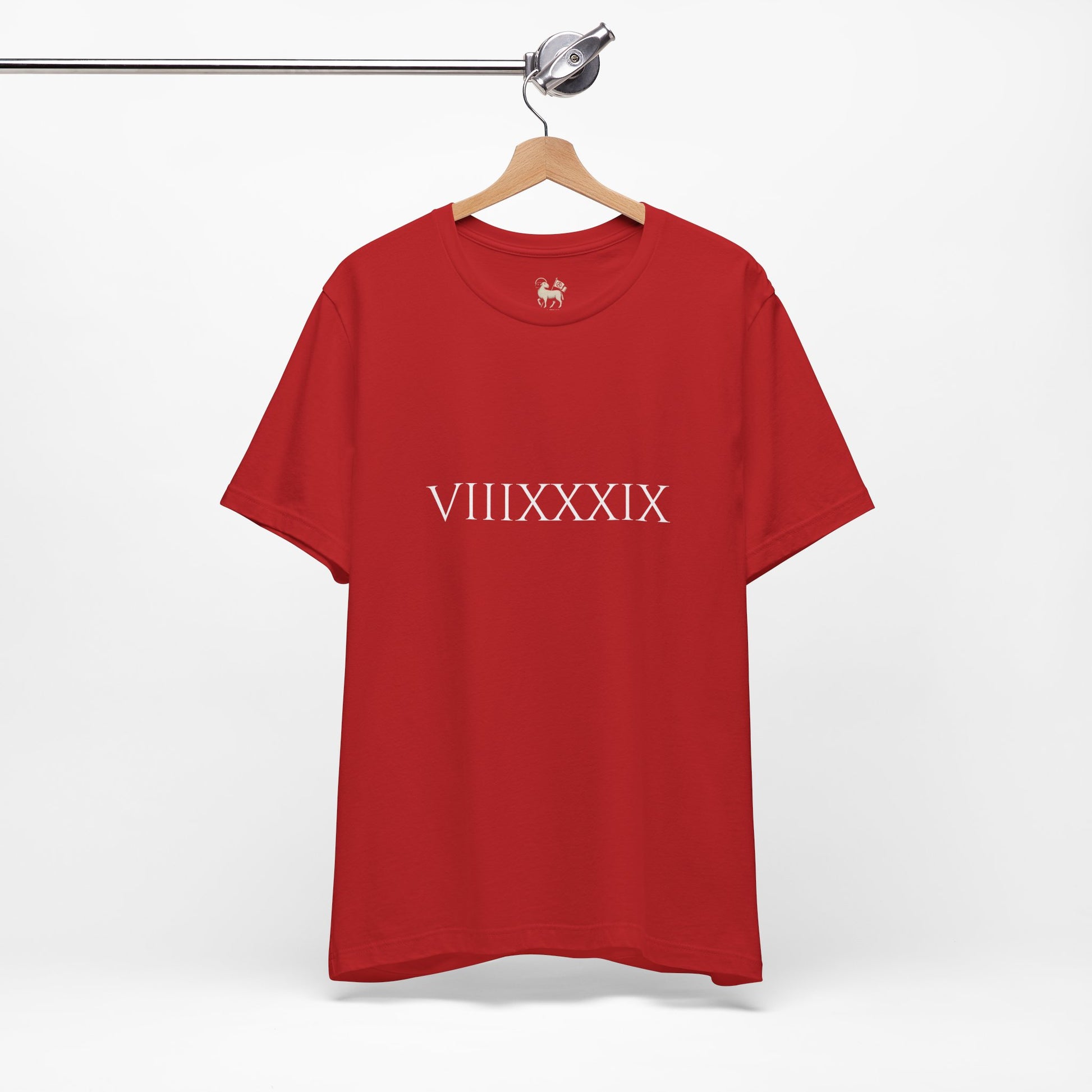 Side angle of the Invincibles to Unforgettables tee — Roman numerals marking the 8,039 days between Arsenal's Invincibles squad and the 2026 champions, by Unruly Thread.