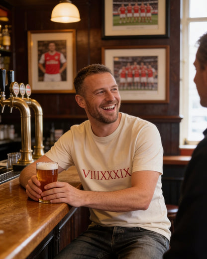 Back view of the Invincibles to Unforgettables Arsenal champions t-shirt by Unruly Thread — wearable receipt for the 22-year Premier League title wait.