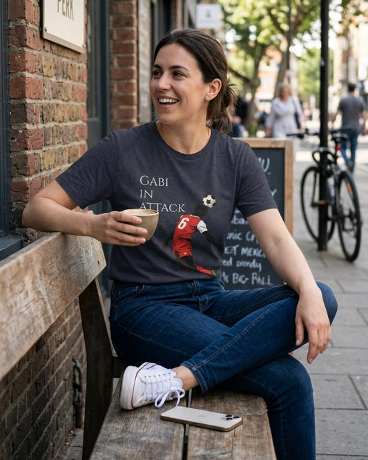 Front view of the Gabi at the Back, Gabi in Attack Arsenal terrace chant t-shirt by Unruly Thread — hand-drawn cartoon of Arsenal number 6 mid-header pose with chant lyric chest print.