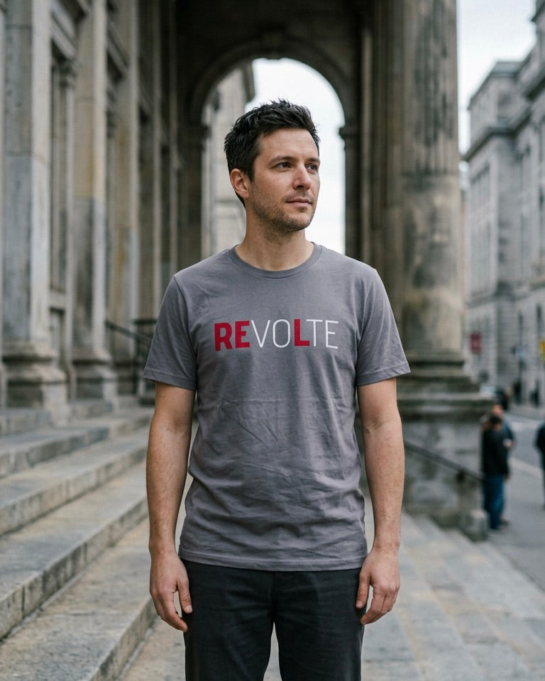 Storm grey VOTE → REVOLT Truth Demand tee by Unruly Thread — REVOLT chest print, RE in red.