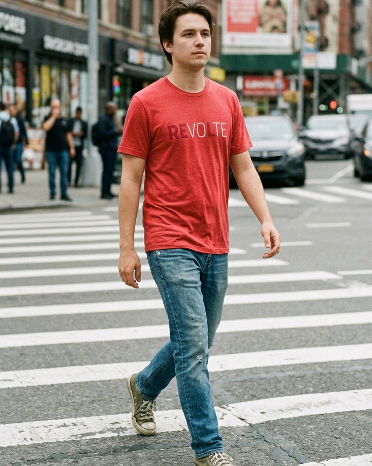 Heather red VOTE → REVOLT Truth Demand tee by Unruly Thread — REVOLT chest print, RE in deeper red.