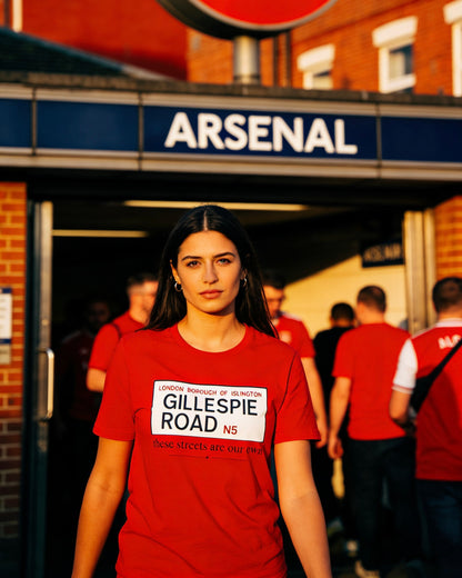 Red Gillespie Road Arsenal N5 street sign tee by Unruly Thread — Islington nameplate chest print reading GILLESPIE ROAD, N5, with 'these streets are our own' beneath.