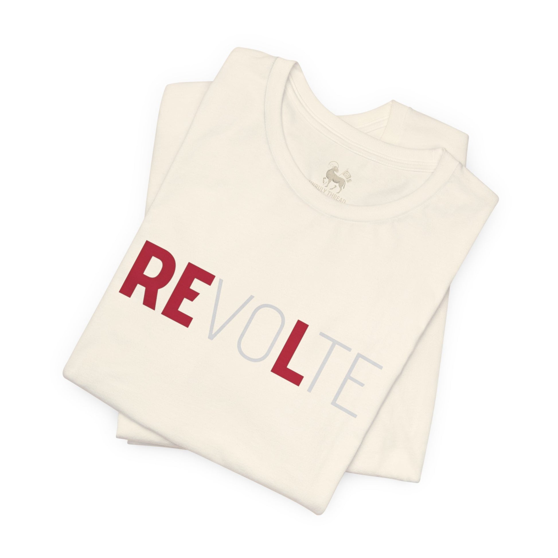 Lifestyle view of the VOTE → REVOLT Truth Demand tee by Unruly Thread — REVOLT chest print visible.