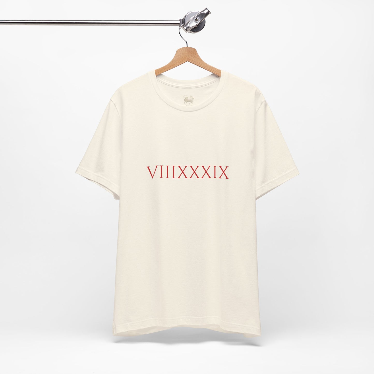 Close-up of the chest print on the Invincibles to Unforgettables tee — Roman numerals VIIIXXXIX, Arsenal champions shirt, Unruly Thread.
