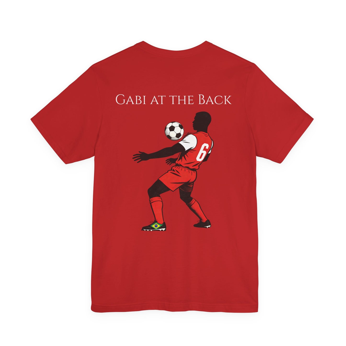 Folded view of the Gabi at the Back, Gabi in Attack Arsenal terrace chant tee — hand-drawn cartoon design honoring Gabriel Magalhães, by Unruly Thread.