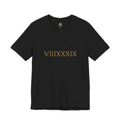 Flat lay of the Invincibles to Unforgettables tee — VIIIXXXIX Roman numerals marking the 8,039 days between Arsenal's last two titles, Unruly Thread.