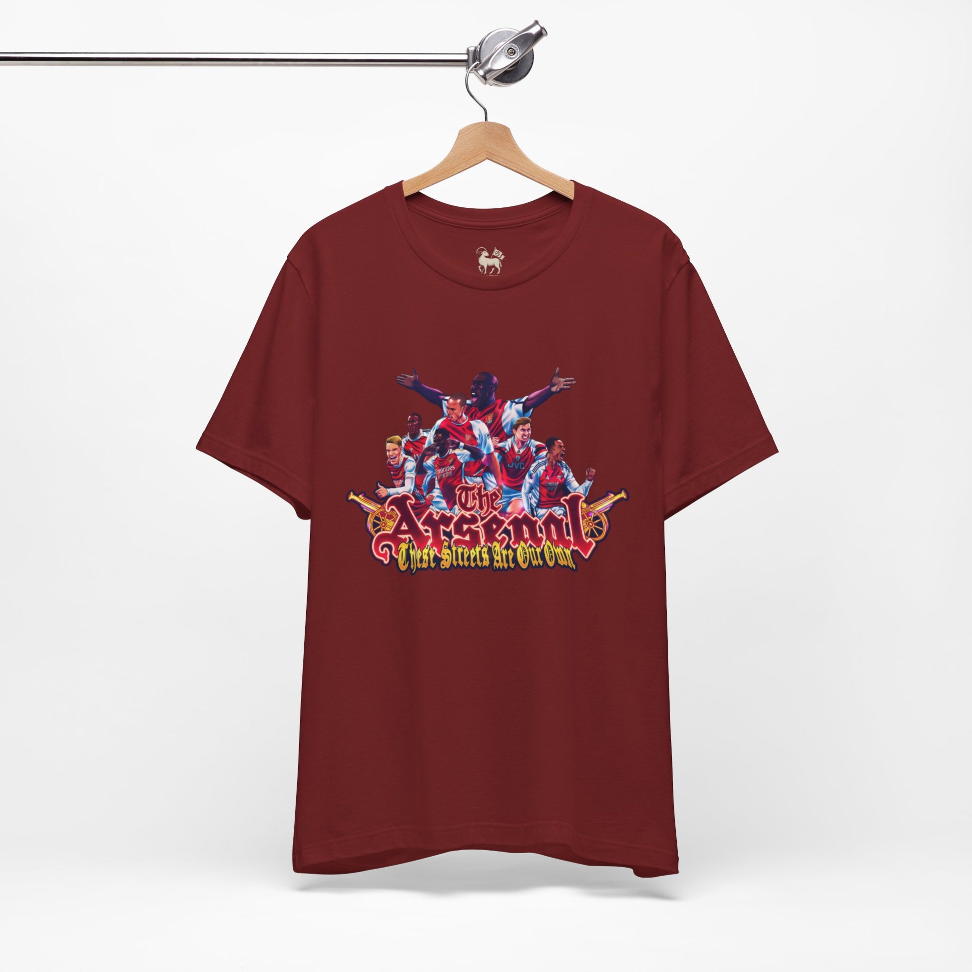 Detail print view of the Arsenal Tifo tee — mural-style North Bank artwork on the chest, by Unruly Thread.